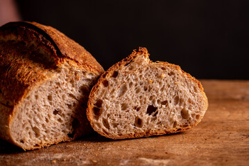 man cutting homemade bread