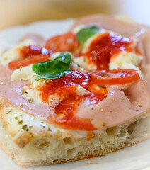 Roman pizza close-up on a white plate