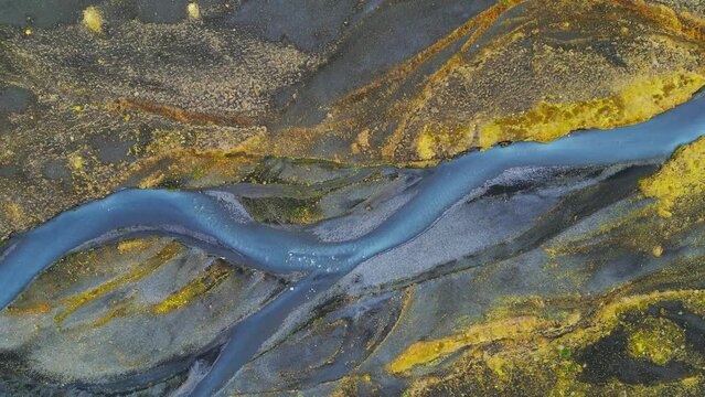 River running trough the black sand dunes in Iceland 