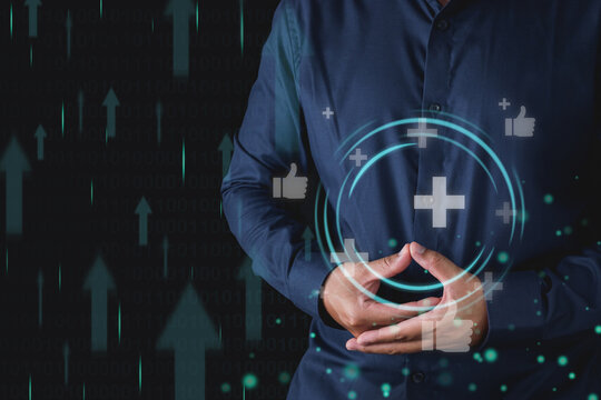 The man gets promoted to high level. Manifest body healing. Medium close up shot with virtual screen. Manipulation concept. Isolated on black background.