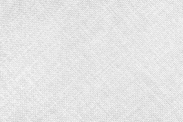 Plakat Jacquard woven upholstery, white coarse fabric texture with diagonal weave lines. Textile background, furniture textile material, wallpaper, backdrop. Cloth structure close up.
