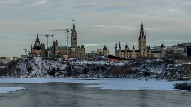 4k holy grail day to night timelapse taken from Majors Hill Park in downtown Ottawa Canada with view to the historical buildings of the Canadian parliament and its surroundings.