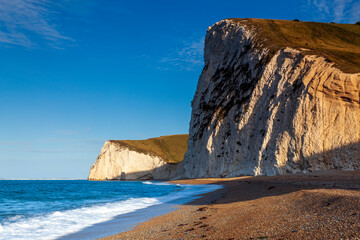 View west from Durdle Door to the chalk headland of Bat's Head on the Dorset coast.