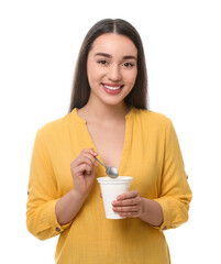 Happy woman with tasty yogurt on white background