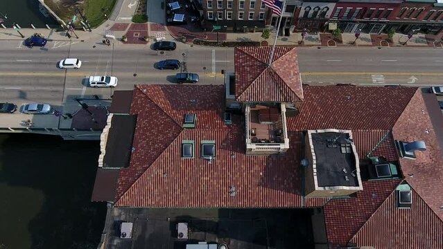St. Charles, Illinois USA. Birds Eye Aerial View of Main Street and Bridge Traffic anc Central Buildings, Drone Shot