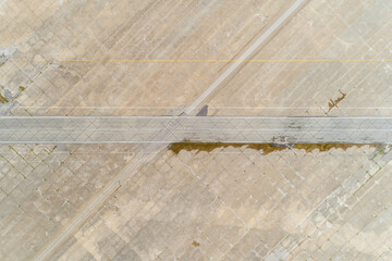Aerial Shot of Old Abandoned concrete airstrip in the midwest
