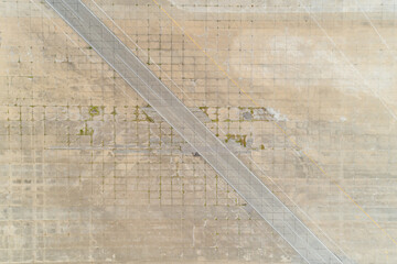 Aerial Shot of Old Abandoned concrete airstrip in the midwest