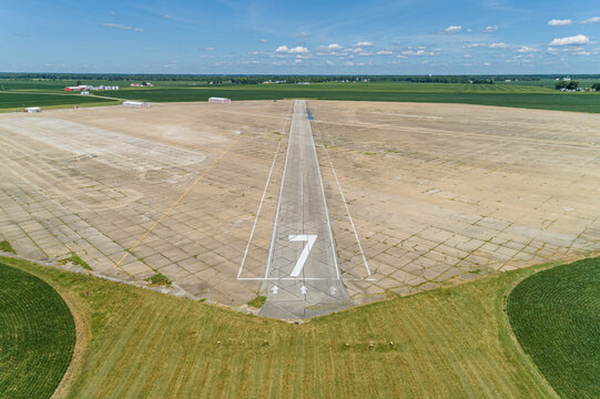 Aerial Shot of Old Abandoned concrete airstrip in the midwest