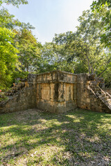 The ruins of a beautiful pyramid in the archaeological zone of Chichen Itza in Mexico