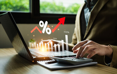 interest rates and dividends, Business people calculate and higher graphs and percentages...