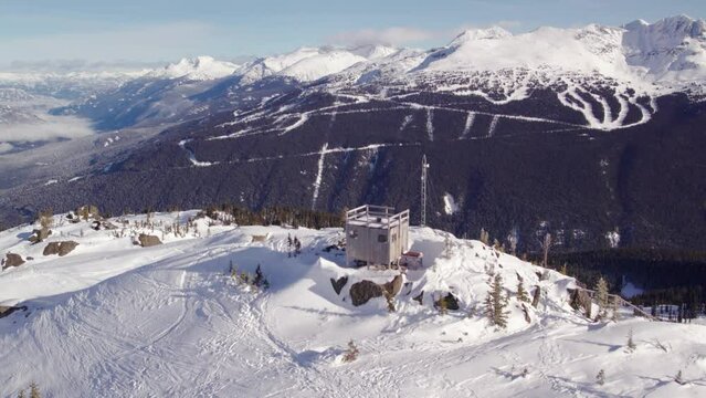 Mountain hut, weather station, aerial drone footage of Whistler mountain. 4K 24FPS