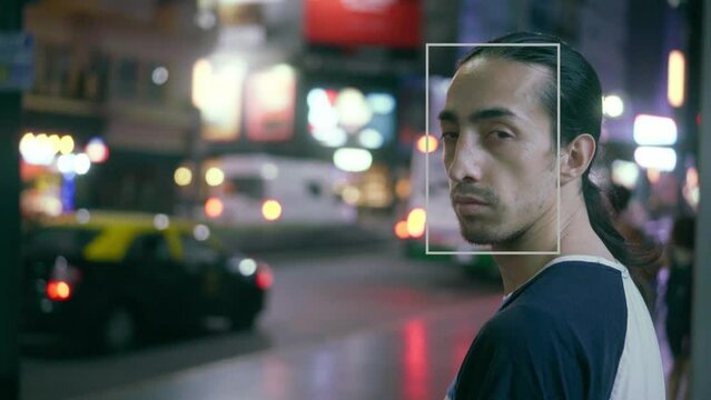 point on view of an autofocus camera with eye recognition on a young latin man looking at the camera, 4k video.