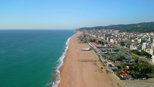 Aerial photography of Pineda de Mar beach offers a unique perspective of this vibrant coastal town.