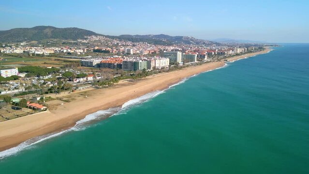 The aerial views of Pineda de Mar beach showcase the stunning beauty of this vibrant coastal town.