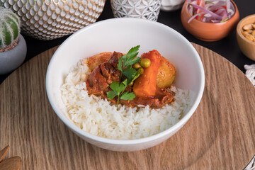Beef stew estofado Assorted food plates Peru traditional comfort food buffet table