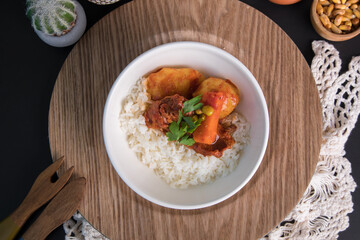 Beef stew estofado Assorted food plates Peru traditional comfort food buffet table
