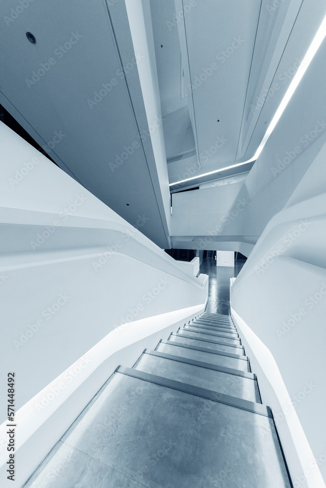 Poster empty futuristic stairway in modern building. architectural abstract background