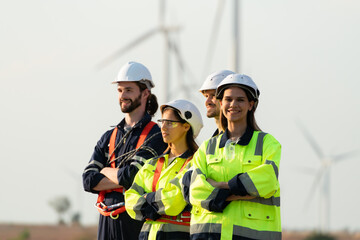 Portrait of engineer stationed at the Natural Energy Wind Turbine site. with daily audit tasks of major wind turbine operations that transform wind energy into electrical electricity