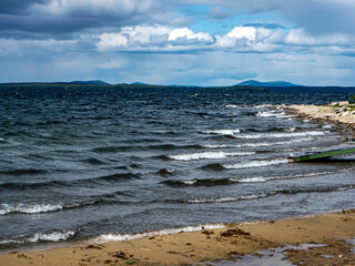rocky shore of the lake in the morning