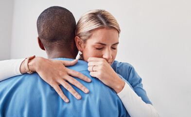 Comfort, support and doctors hugging in the hospital after the death of a patient in surgery....