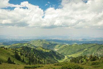 Fototapeta na wymiar Summer landscape in the Almaty mountains in cloudy weather.