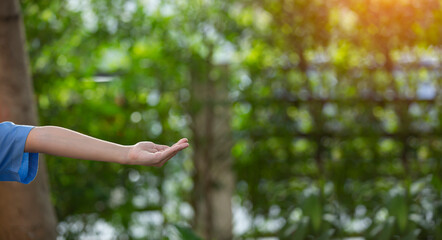 Technology, hand holding with environment Icons over the Network connection on green background.