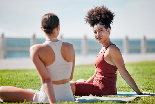 Yoga, park and couple of friends or women talking of fitness, exercise and wellness class in diversity and support. Happy black woman or people with zen, health and holistic sports together in nature