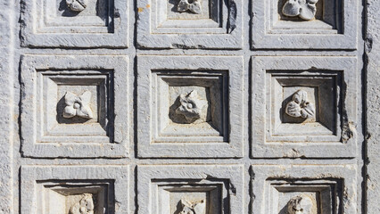 decoration of an ancient building with plaster stucco close-up