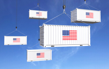 Container hanging with American flag on blue sky