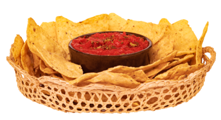 Delicious nachos with red sauce. Stock photo of tortilla chips inside a basket. Corn chips isolated stock photo. Snack. Salsa. Tomato. Tasty. Dip.