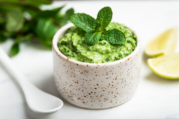Indian green chutney, selective focus