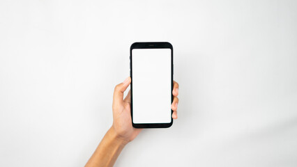 Hands holding blank screen smartphone for interface display