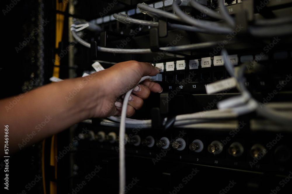 Aufkleber Engineer hands, server room and connection cable for maintenance or software update at night. Cybersecurity, female programmer and woman holding wire for database, networking and cloud computing.