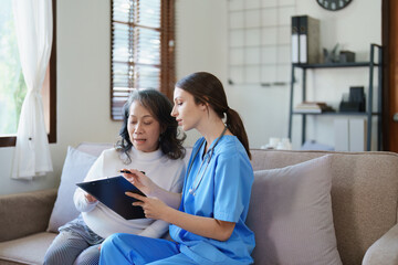 Portrait of a female doctor holding a patient clipboard to discuss and analyze the patient's condition before treating.