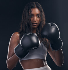 Boxing champion, portrait and woman on black background for sports, strong focus and mma training....