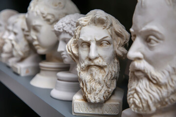 Plaster bust of philosopher Anaximander and group of other busts. Portraits of ancient historical...