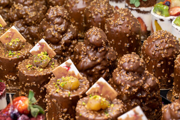 Types of cakes. Delicious cakes in bulk at the patisserie counter. close up