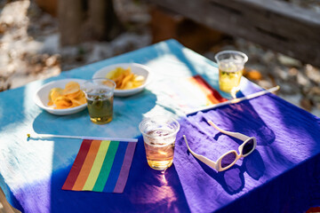 LGBT pride parade party with rainbow flag