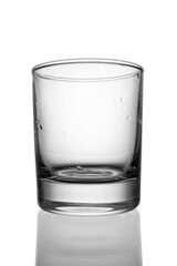 Empty low glass for a cocktail close-up on a white background