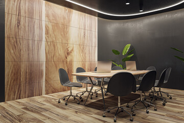 Luxury wooden and black meeting room interior with equipment, furniture and decorative plants....