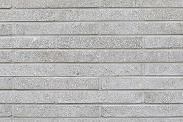 white brick wall, grey background