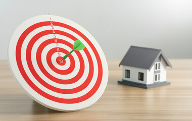 arrow on the center of the dartboard for target planning and manage to buy a house to success...
