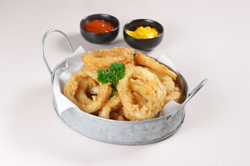 Cumi Goreng Tepung or Crispy Calamari rings or Fried Squids with Sauce.