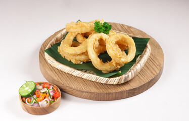 Cumi Goreng Tepung Sambal Matah or Crispy Calamari rings or Fried Squids with Sambal Matah sauce.