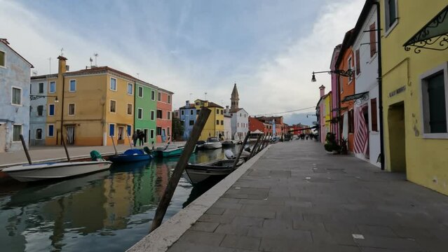 Narrow canal near the famous painted houses, Burano island Venice Italy, winter