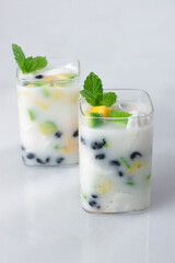 Es Buah or Sop Buah is Mixed Fruit and Jelly with Coconut Water Served with Shaved Ice and Condensed Milk. Es Campur.