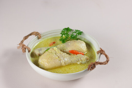 Ayam Masak Lemak Cili Api is Chicken in Spicy Coconut Milk Soup. Malaysian Traditional Dish from Negeri Sembilan.