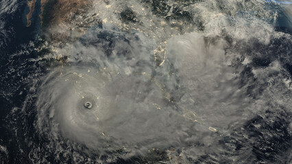 hurricane approaching the American continent visible above the Earth, a view from the satellite. Elements of this image furnished by NASA.