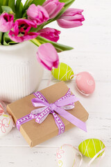 Fresh pink tulip flowers and easter eggs