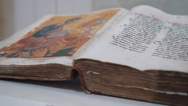 Ancient Georgian Orthodox Christian holy book close up.